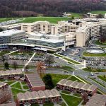 Arial view of the Hershey Medical Center and Penn State College of Medicine campus – complex of buildings and parking lots