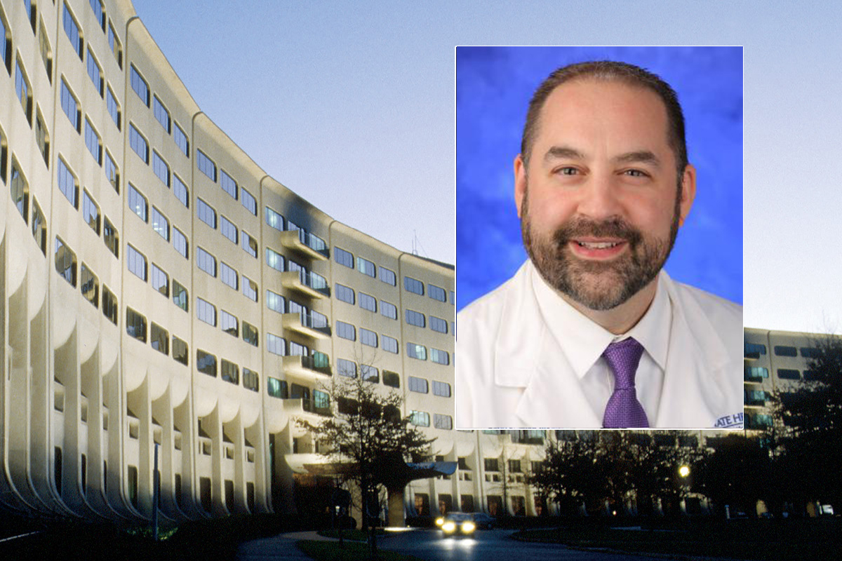 A head and shoulders professional portrait of Donald Bucher against a background image of Penn State College of Medicine.