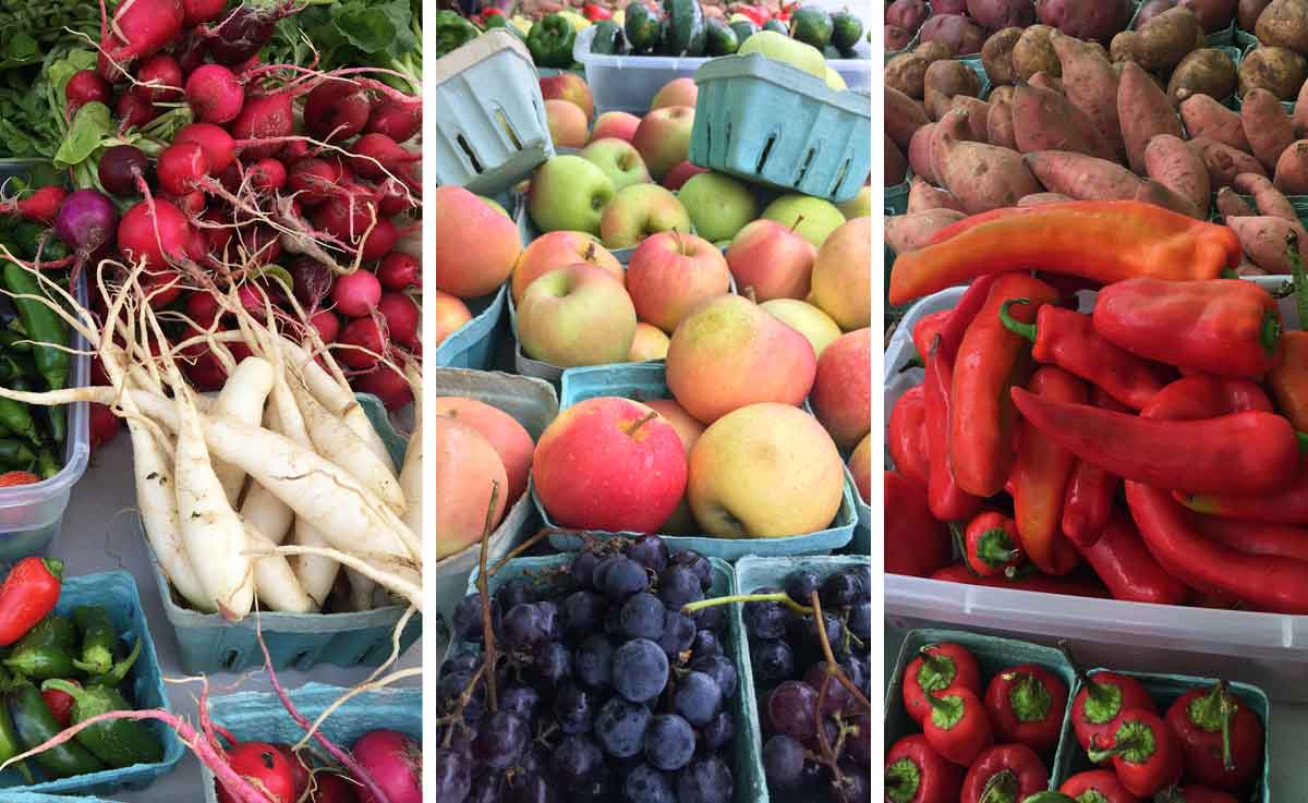 A collage of fruits and vegetables on display at an outdoor farmer's market stand.
