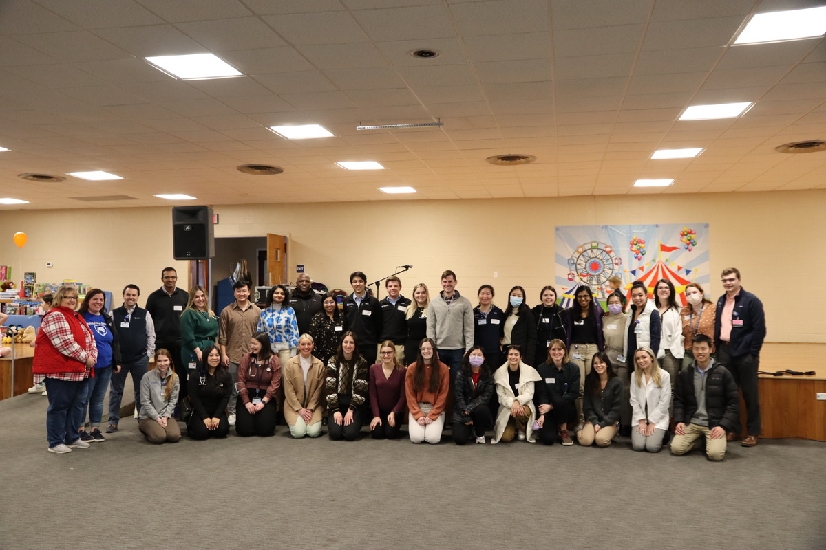 A group of medical students at Penn State College of Medicine gather for a group photo at a community outreach event on Saturday, Jan. 28 in Lykens.