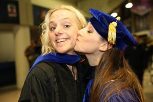 Kathleen Keller says goodbye to former nutritional sciences doctoral student Shana Adise on graduation day. 
