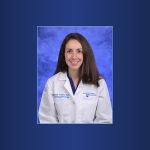 A portrait of Dr. Elizabeth Federici in a white coat.