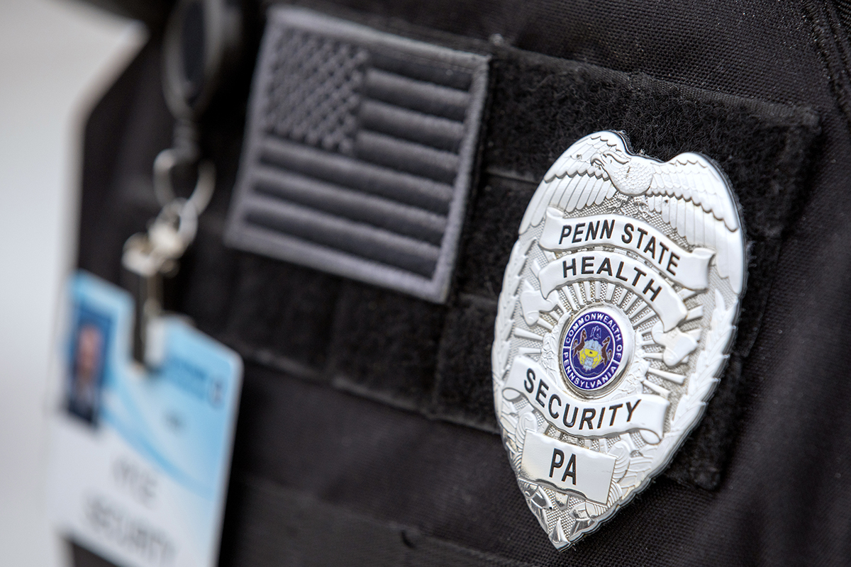 Close-up of a Penn State Health Security badge