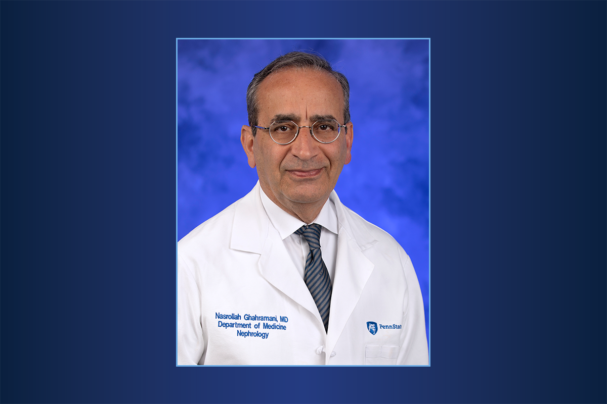 Portrait of Dr. Nasrollah Ghahramani in doctor's coat, on a gradient background