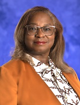 Professional portrait of Lynette Chapelle-Williams, chief diversity officer at Penn State Health. She is wearing a suit, blouse and glasses.