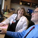 Aileen McCormick, left, a registered nurse with the department of Neurology at Penn State Health Milton S. Hershey Medical Center, talks with Dr. Gary Thomas on Thursday, March 2, 2023.