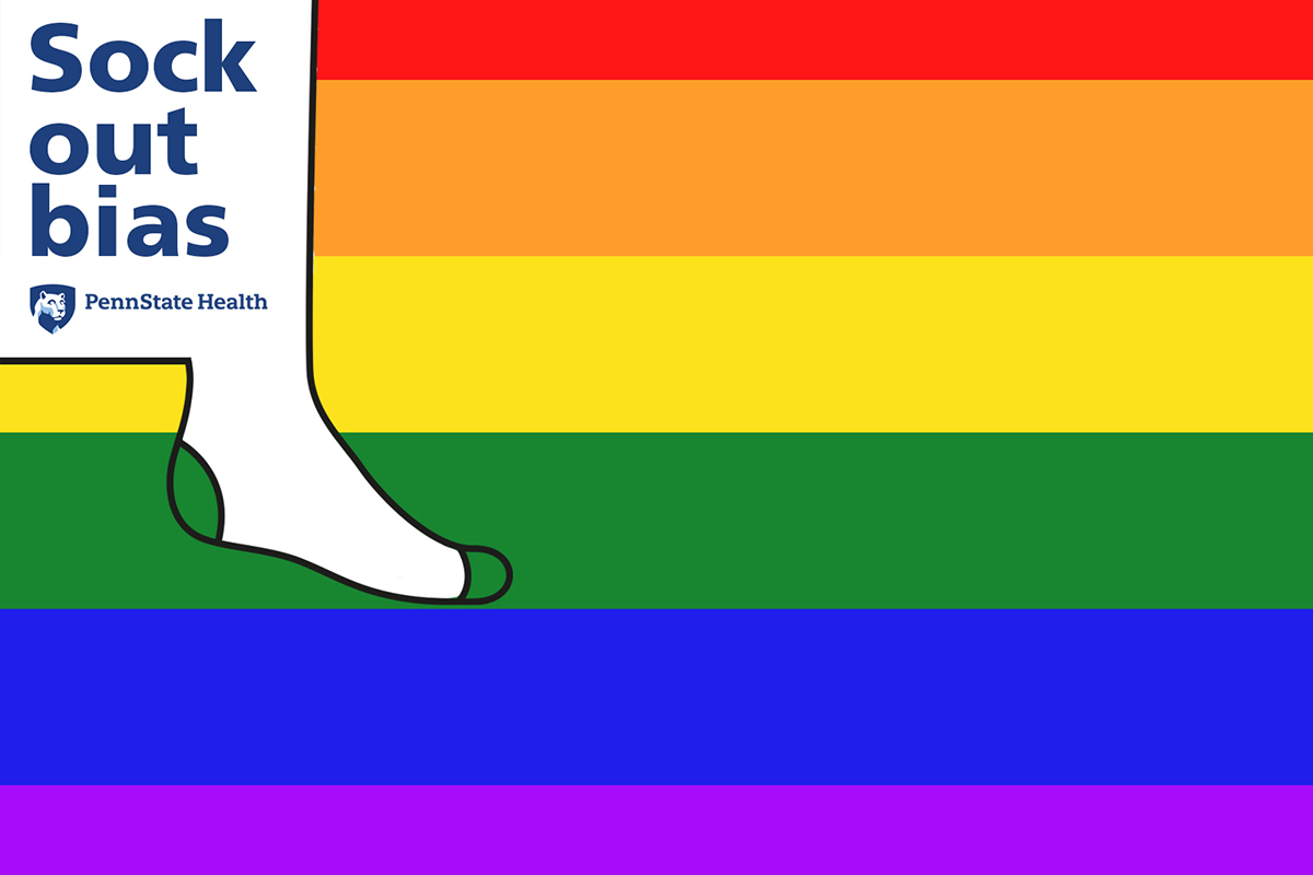 Employees show their support during Sock Out Bias on National Coming Out  Day - Penn State Health News