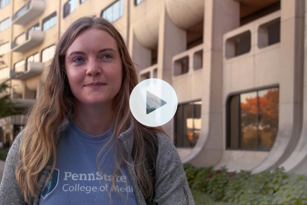 Lydia Smeltz with the College of Medicine crescent in the background