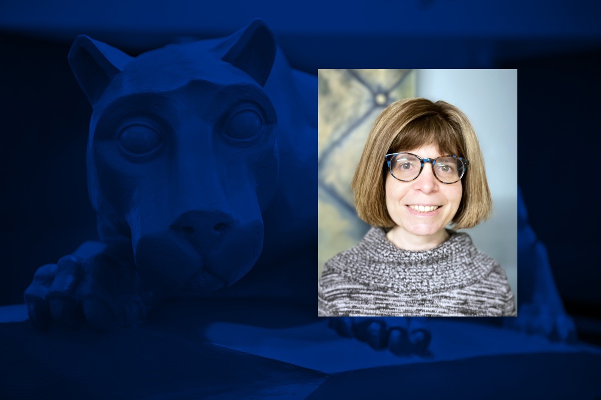 A headshot of a woman wearing glasses is overlaid on a blue graphic with a statue of a lion mascot