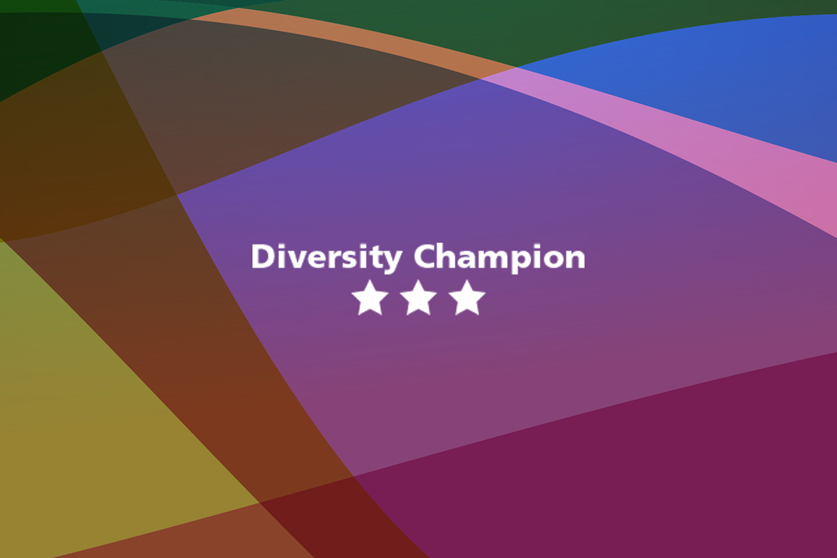 The image displays the Inclusion Academy Champion signature item that champions will be able to include in their email signature. The rectangular insignia includes three stars and the words Diversity Champion on it.