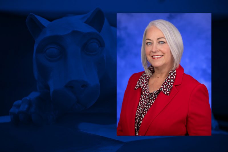 A headshot of Teresa Swenson, wearing professional attire, placed over an image of a Penn State Nittany Lion statue.