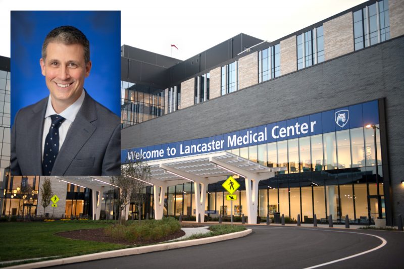 A headshot photograph of Dr. Joseph MacDonald wearing a suit and tie is superimposed over an image of Penn State Health Lancaster Medical Center.