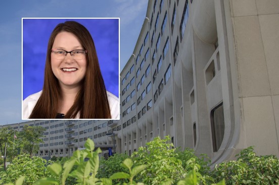A head and shoulders professional portrait of Larissa Whitney against a background image of Penn State College of Medicine.