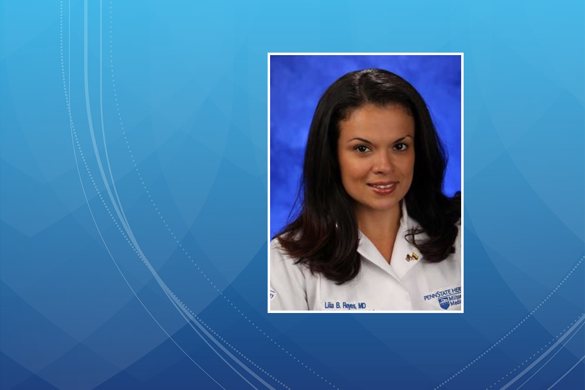A professional headshot of Dr. Lilia Reyes wearing a lab coat with her name on the left and the Penn State Health Milton S. Hershey Medical Center logo on the right.