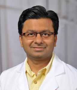 A professional headshot of Shyam Bansal.