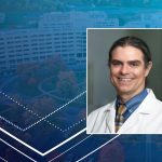 A professional headshot of Jason Mills, MD, PhD