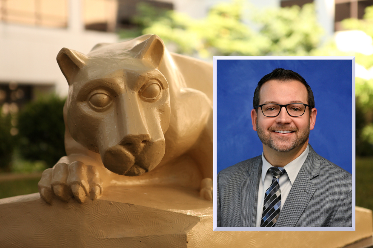 A professional headshot of Joseph Wysock, wearing a suit and tie, is superimposed over an image of a Penn State Nittany Lion statue.