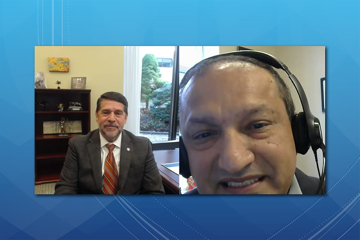 In a split-screen image, Hector Ortiz, program manager for education with Penn State Health’s Office of Health Advancement and Community Engagement, is shown on the right with a set of earphones conducting the podcast. On the left side of the screen is Don McKenna, president of Milton S. Hershey Medical Center. Dressed in a business suit, McKenna sits in a chair in his office. A bookcase is behind him.