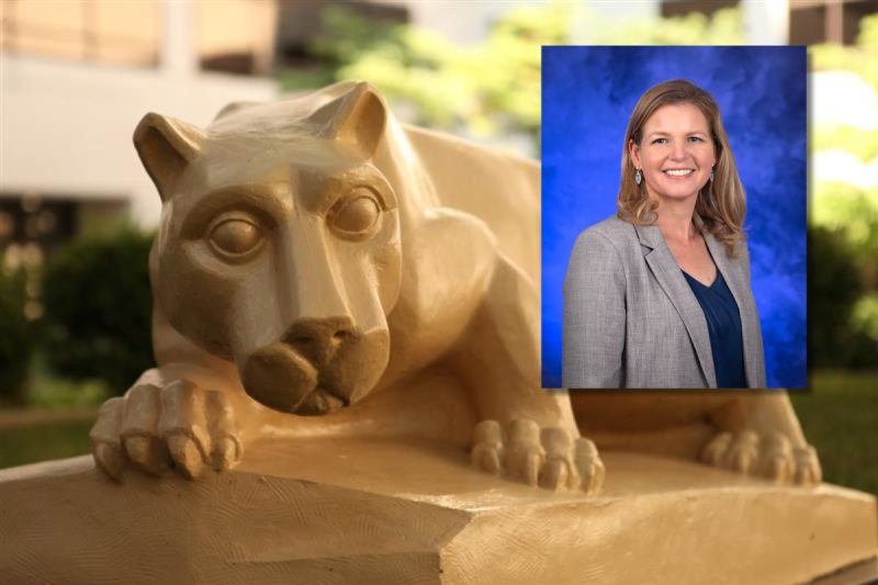 A close-up photo of a nittany lion statue resting on a stone base outdoors, with a professional portrait of a smiling woman in a gray blazer overlaid in the upper-right corner against a blue studio background.