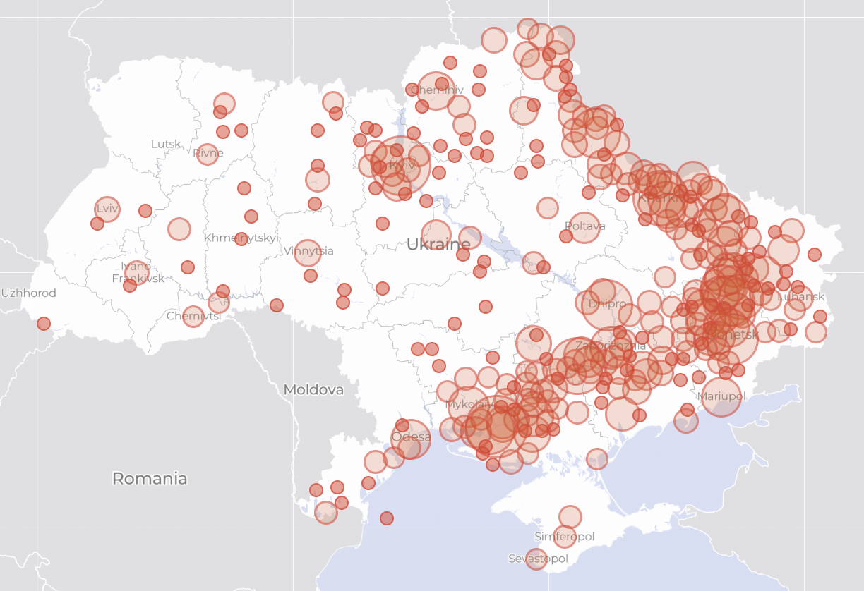 A map of Ukraine shows a large number of reddish circles of different sizes covering various parts of the country