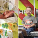 A baby is in an incubator in a neonatal intensive care unit with a breathing tube and a heart monitor.
