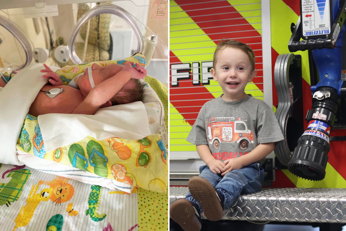 A baby is in an incubator in a neonatal intensive care unit with a breathing tube and a heart monitor.